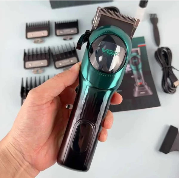 ماشین اصلاح وی جی آر مدل V-166 با برش مستقیم و تیغه استیل ضد زنگ (رنگ بصورت رندوم)